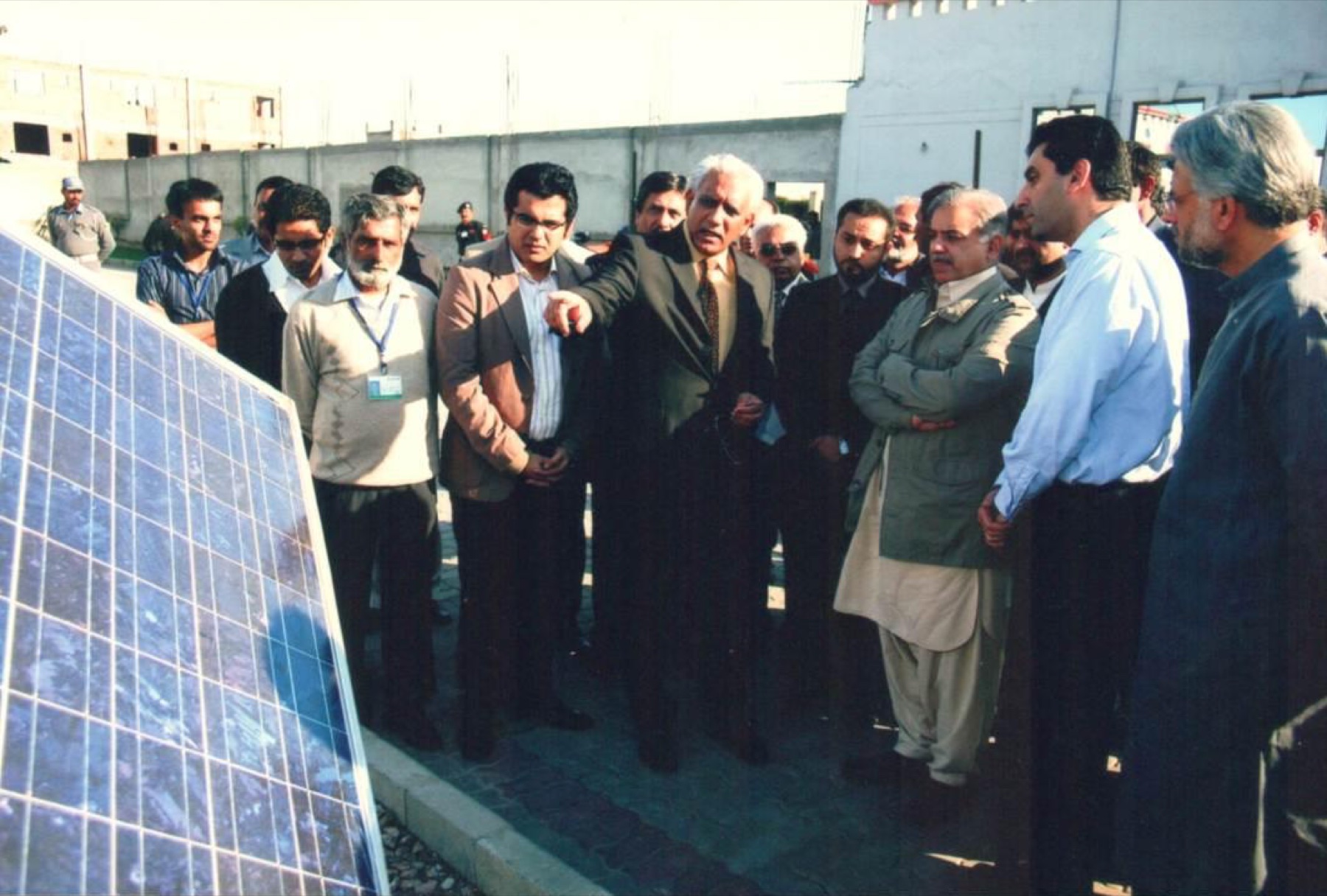Introducing a solar-powered irrigation and power generation system to the Chief Minister of Punjab, on a visit to the operation.